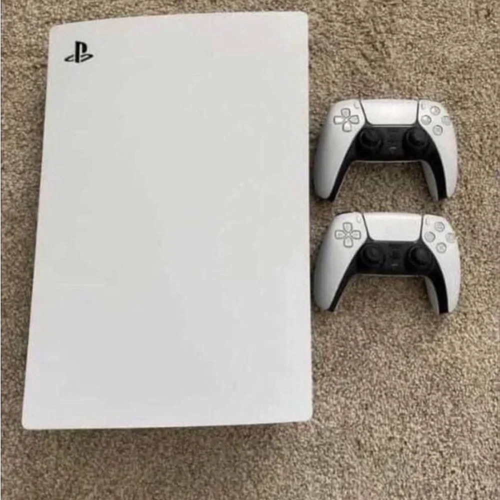 Sony PlayStation Console with Dual Controllers - White